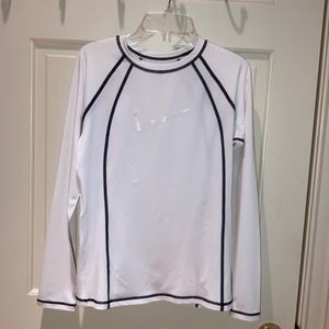 Women’s Nike white with black topstitching  top.